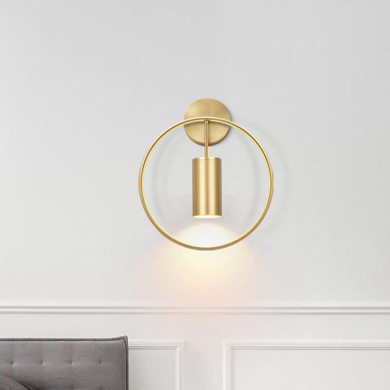 Round golden wall lamp